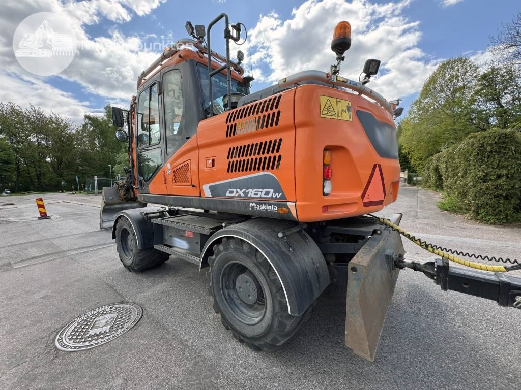 Doosan DX 160 W - Escavadeira de rodas: foto 2 Doosan DX 160 W - Escavadeira de rodas: foto 2