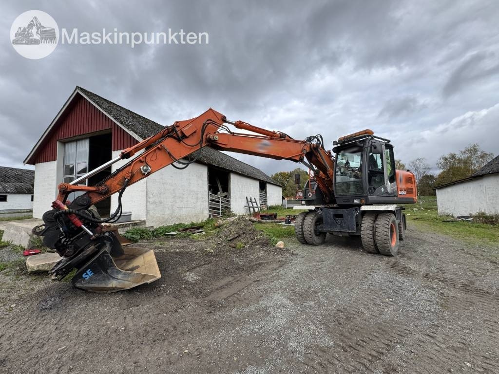 Hitachi ZX 140 W-3 - Escavadeira de rodas: foto 1 Hitachi ZX 140 W-3 - Escavadeira de rodas: foto 1
