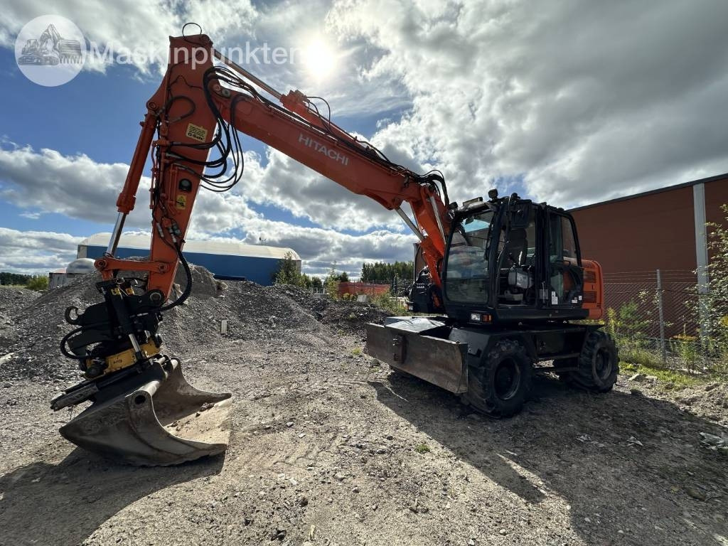 Hitachi ZX 140 W-5B - Escavadeira de rodas: foto 1 Hitachi ZX 140 W-5B - Escavadeira de rodas: foto 1