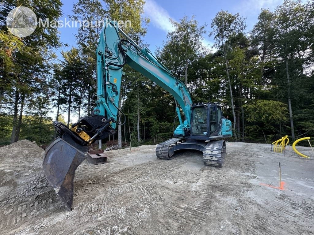 Kobelco SK 210 LC-10  - Escavadora de rastos: foto 1 Kobelco SK 210 LC-10  - Escavadora de rastos: foto 1