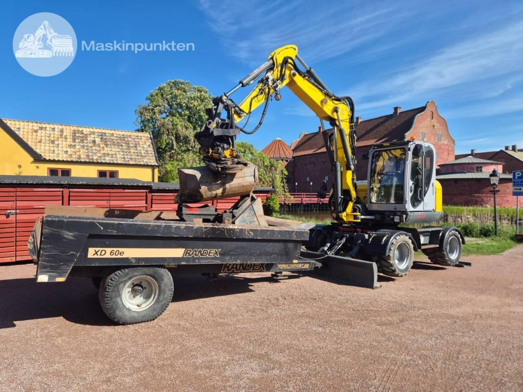 Wacker Neuson EW 100 med vagn - Escavadeira de rodas: foto 1 Wacker Neuson EW 100 med vagn - Escavadeira de rodas: foto 1