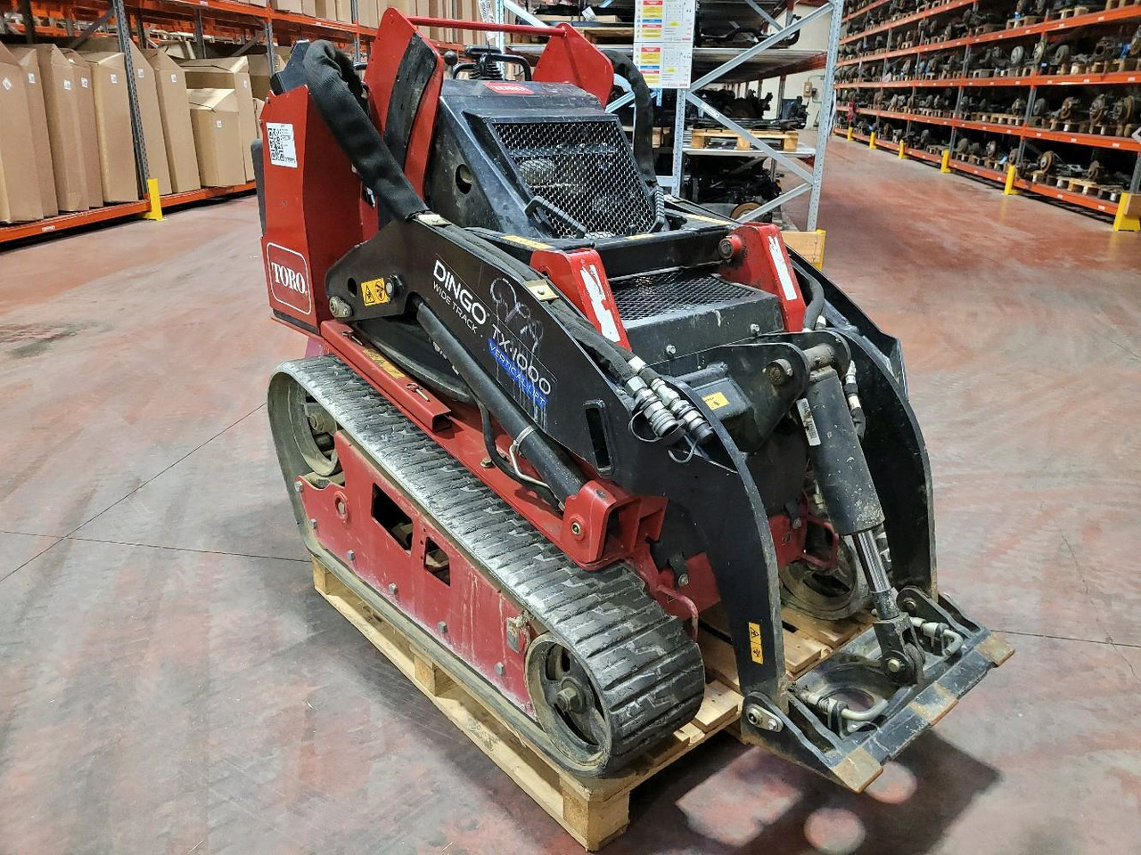 Mini carregadeira de esteiras DIVERS DINGO TX 1000: foto 1