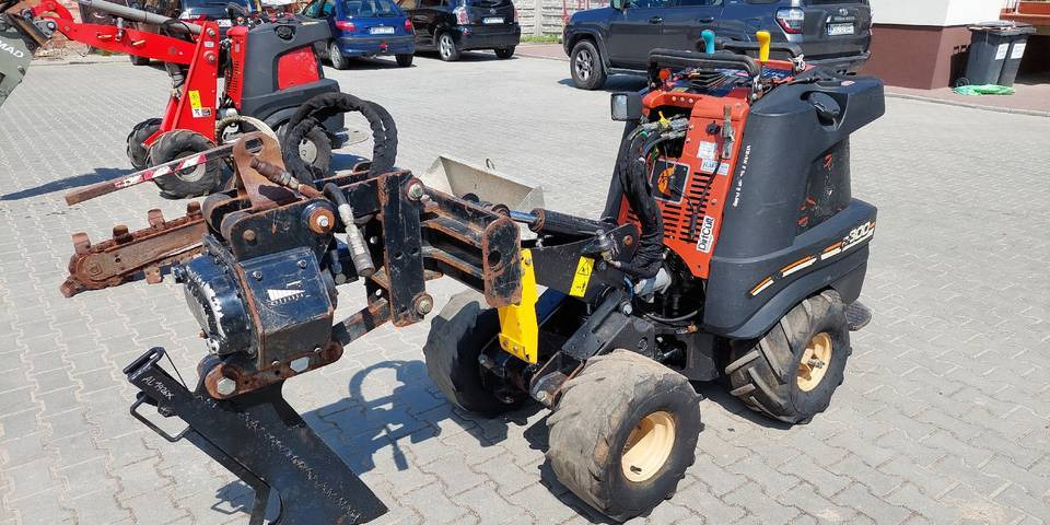 Ditch Witch R300 koparka łańcuchowa pługoukładacz - Colocadora de tubagem: foto 1 Ditch Witch R300 koparka łańcuchowa pługoukładacz - Colocadora de tubagem: foto 1