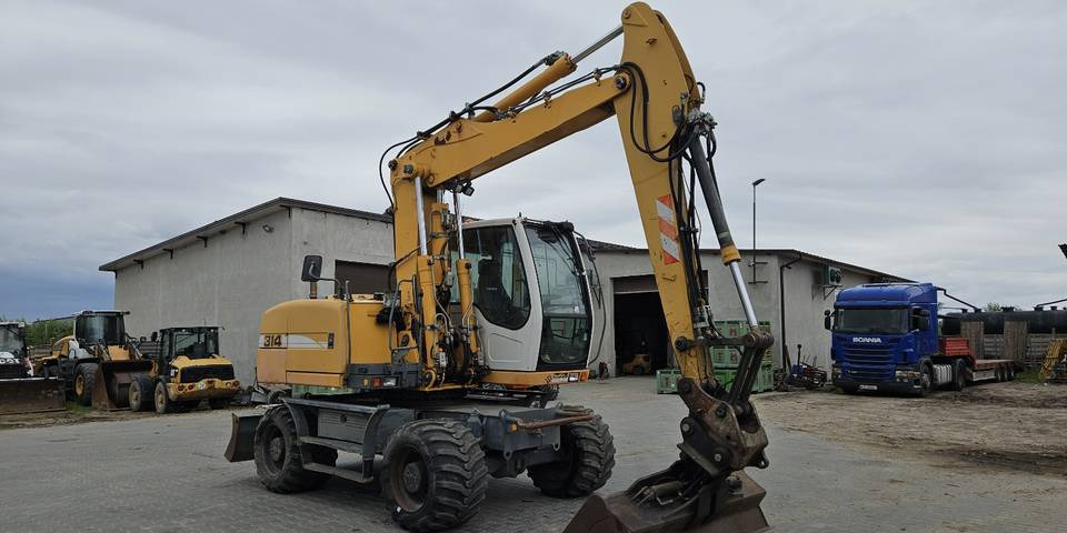 Koparka kołowa Liebherr A314 Litronic 9350 h+ 5 łyżek kołówka - Escavadeira de rodas: foto 4 Koparka kołowa Liebherr A314 Litronic 9350 h+ 5 łyżek kołówka - Escavadeira de rodas: foto 4
