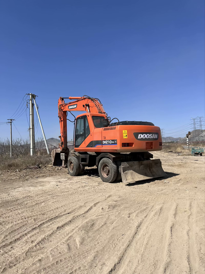 DOOSAN 210w-7 - Escavadeira de rodas: foto 5 DOOSAN 210w-7 - Escavadeira de rodas: foto 5