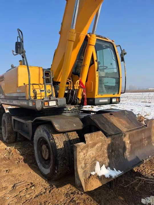 Used Korea Brand Original hyundai 210w-9 Wheel Excavator for Sale Used hyundai Wheel Excavator - Escavadora de rastos: foto 2 Used Korea Brand Original hyundai 210w-9 Wheel Excavator for Sale Used hyundai Wheel Excavator - Escavadora de rastos: foto 2