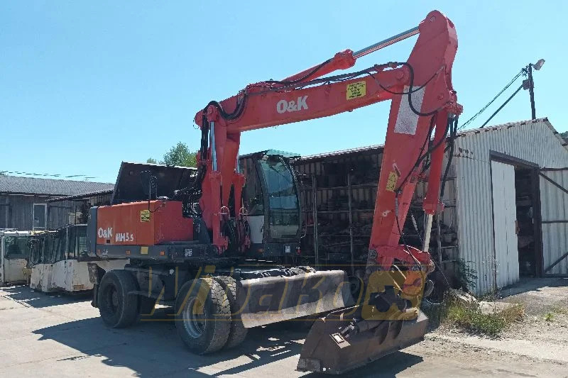 O&K MH5.5 - Escavadeira de rodas: foto 1 O&K MH5.5 - Escavadeira de rodas: foto 1