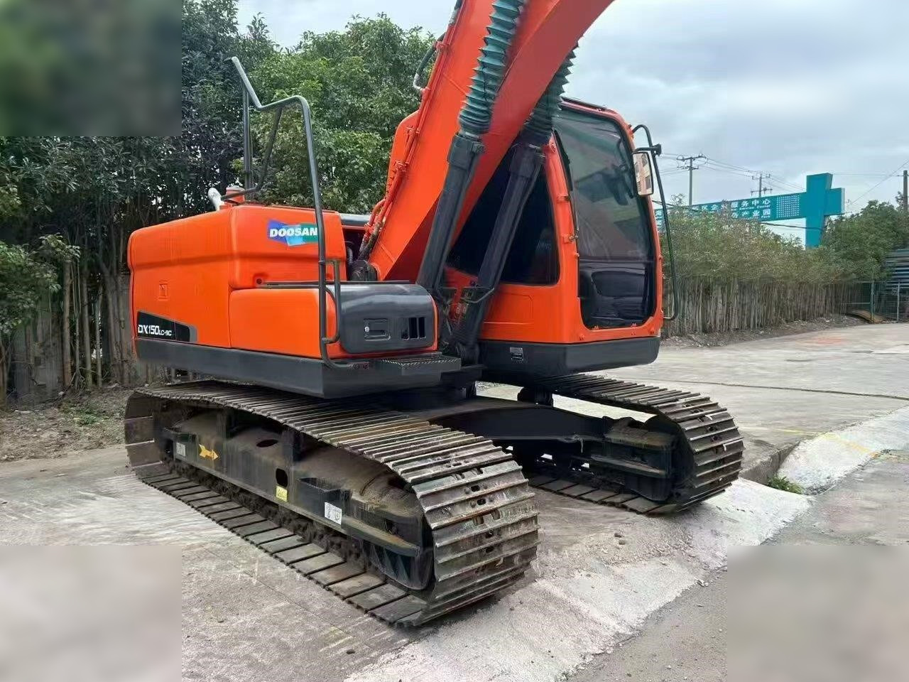 DOOSAN DX150W-9C - Escavadeira de rodas: foto 1 DOOSAN DX150W-9C - Escavadeira de rodas: foto 1