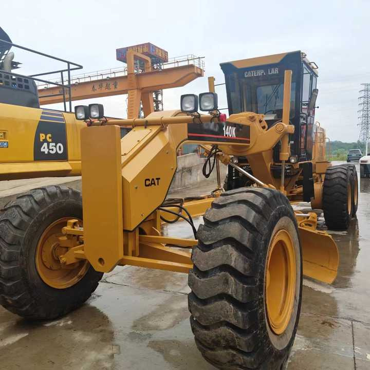 Used Cat 140K New Model Grader Popular Brand Japan Cat Hydraulic Machinery Construction Equipment - Motoniveladora: foto 1 Used Cat 140K New Model Grader Popular Brand Japan Cat Hydraulic Machinery Construction Equipment - Motoniveladora: foto 1