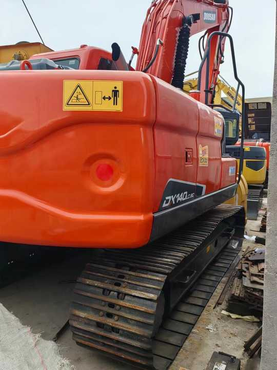 Used Digger DOOSAN DX140 Construction Machinery Construction Digger Used DOOSAN DX140 Cheap Excavator - Escavadora de rastos: foto 3 Used Digger DOOSAN DX140 Construction Machinery Construction Digger Used DOOSAN DX140 Cheap Excavator - Escavadora de rastos: foto 3