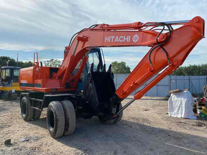 Used Hitachi Ex100WD Wheel Excavator for Sale Japan Made Hitachi Ex100wd Wheeled Excavator for Sale - Escavadora de rastos: foto 3 Used Hitachi Ex100WD Wheel Excavator for Sale Japan Made Hitachi Ex100wd Wheeled Excavator for Sale - Escavadora de rastos: foto 3