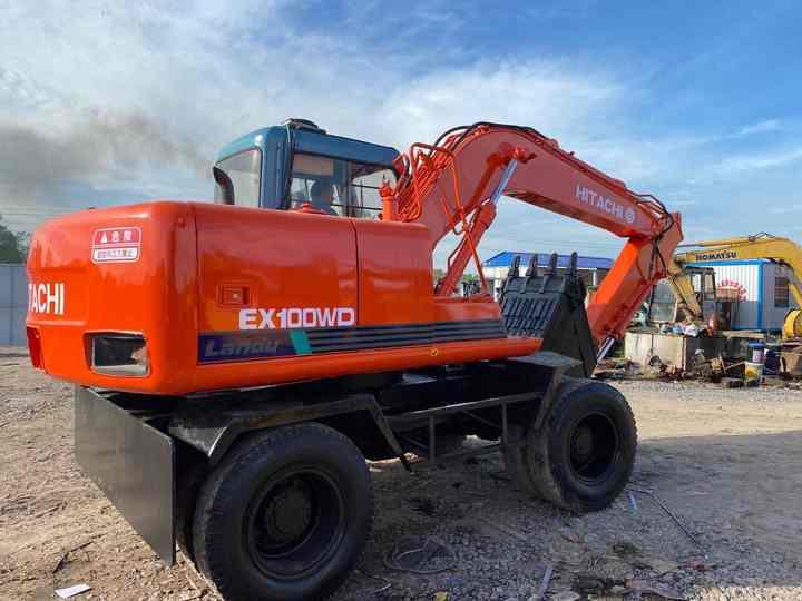 Used Hitachi Ex100WD Wheel Excavator for Sale Japan Made Hitachi Ex100wd Wheeled Excavator for Sale - Escavadora de rastos: foto 4 Used Hitachi Ex100WD Wheel Excavator for Sale Japan Made Hitachi Ex100wd Wheeled Excavator for Sale - Escavadora de rastos: foto 4