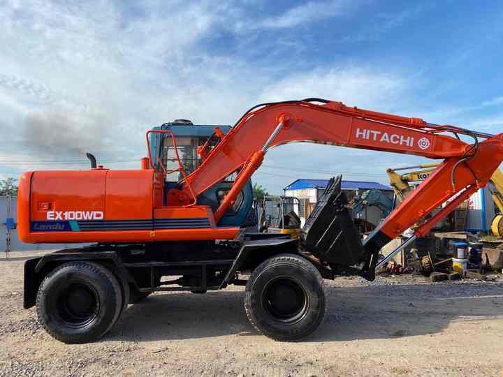 Used Hitachi Ex100WD Wheel Excavator for Sale Japan Made Hitachi Ex100wd Wheeled Excavator for Sale - Escavadora de rastos: foto 2 Used Hitachi Ex100WD Wheel Excavator for Sale Japan Made Hitachi Ex100wd Wheeled Excavator for Sale - Escavadora de rastos: foto 2