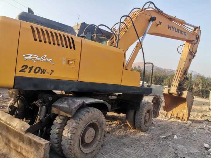 Yellow Color Hyundai210w-7 Used Wheel Excavator Used Hyundai210-7 on Sale with Cheap Price - Escavadora de rastos: foto 5 Yellow Color Hyundai210w-7 Used Wheel Excavator Used Hyundai210-7 on Sale with Cheap Price - Escavadora de rastos: foto 5