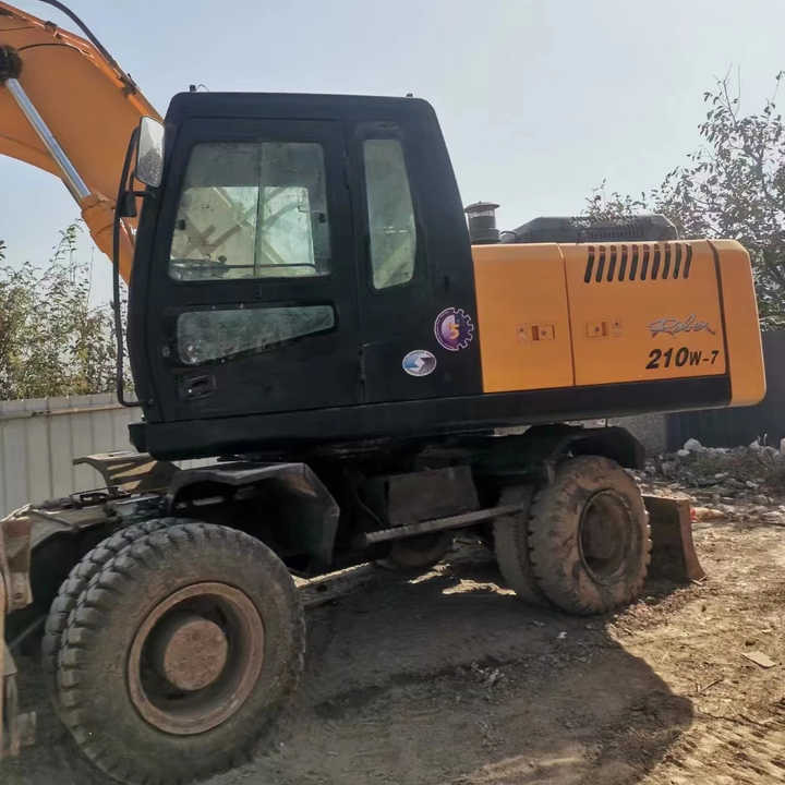 Yellow Color Hyundai210w-7 Used Wheel Excavator Used Hyundai210-7 on Sale with Cheap Price - Escavadora de rastos: foto 1 Yellow Color Hyundai210w-7 Used Wheel Excavator Used Hyundai210-7 on Sale with Cheap Price - Escavadora de rastos: foto 1