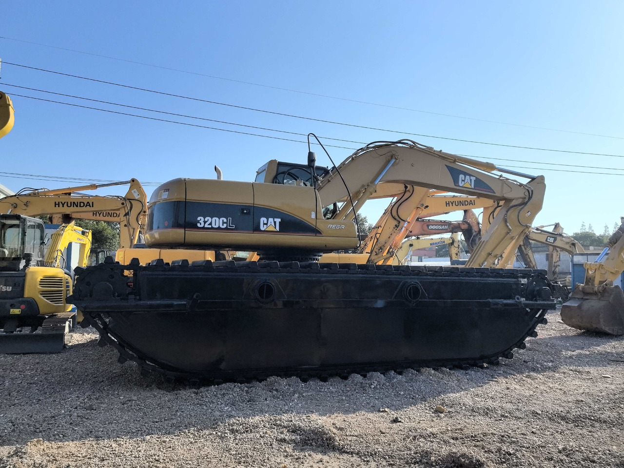 CATERPILLAR 320C - Escavadeira flutuante: foto 1 CATERPILLAR 320C - Escavadeira flutuante: foto 1