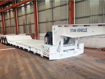 TITAN 3 Axle Lowboy Trailer for Sale in Ghana - Semireboque baixa: foto 1 TITAN 3 Axle Lowboy Trailer for Sale in Ghana - Semireboque baixa: foto 1