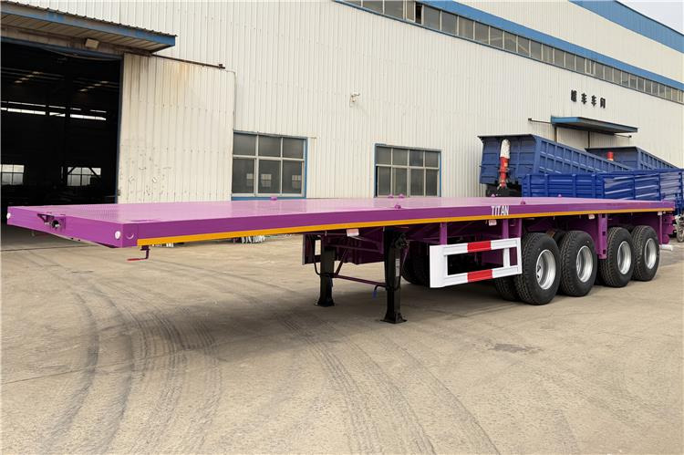 TITAN 4 Axle 40ft Flatbed Semi Trailer for Sale In Guam - Semi-reboque plataforma/ Caixa aberta: foto 1 TITAN 4 Axle 40ft Flatbed Semi Trailer for Sale In Guam - Semi-reboque plataforma/ Caixa aberta: foto 1