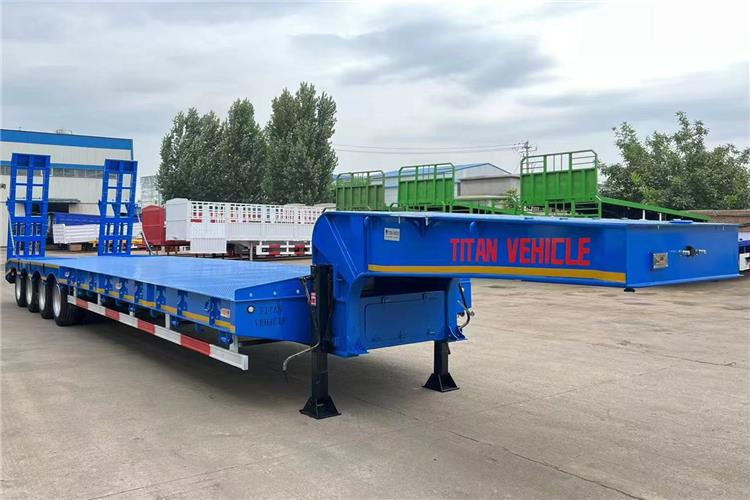 TITAN 4 Axle Low Bed Truck Trailer for Sale In Philippines - Semireboque baixa: foto 1 TITAN 4 Axle Low Bed Truck Trailer for Sale In Philippines - Semireboque baixa: foto 1