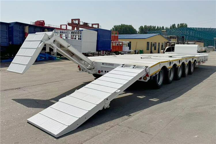 TITAN 5 Axle 100 Ton Low Bed Trailer for Sale In Tanzania - Semireboque baixa: foto 2 TITAN 5 Axle 100 Ton Low Bed Trailer for Sale In Tanzania - Semireboque baixa: foto 2