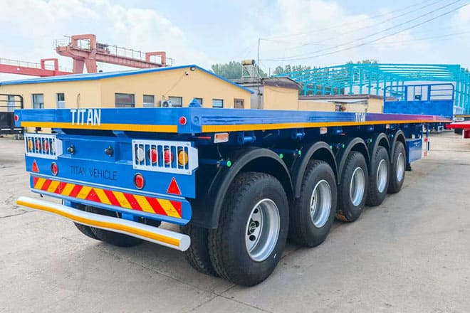 TITAN 5 Axle New Flatbed Trailers for Sale in Mauritius - Semi-reboque plataforma/ Caixa aberta: foto 1 TITAN 5 Axle New Flatbed Trailers for Sale in Mauritius - Semi-reboque plataforma/ Caixa aberta: foto 1