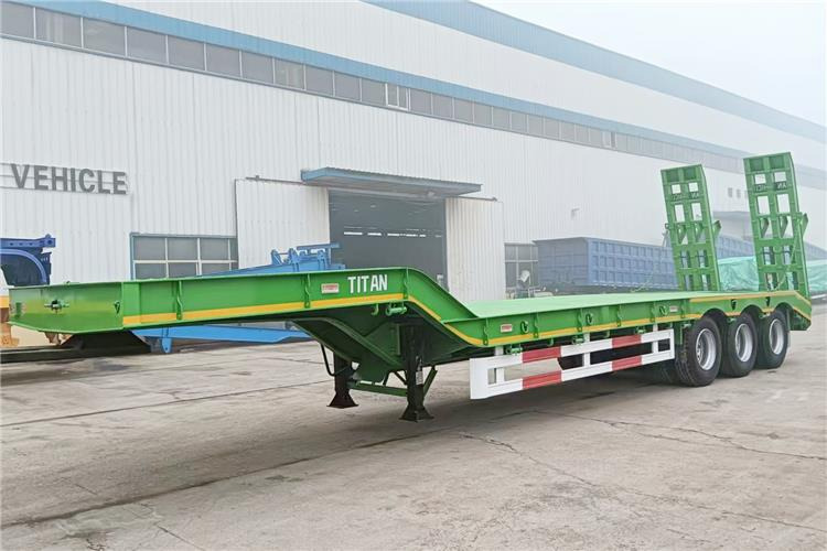 TITAN 80 Ton Equal Width Low Bed Truck Trailer for Sale In Ghana - Semireboque baixa: foto 1 TITAN 80 Ton Equal Width Low Bed Truck Trailer for Sale In Ghana - Semireboque baixa: foto 1
