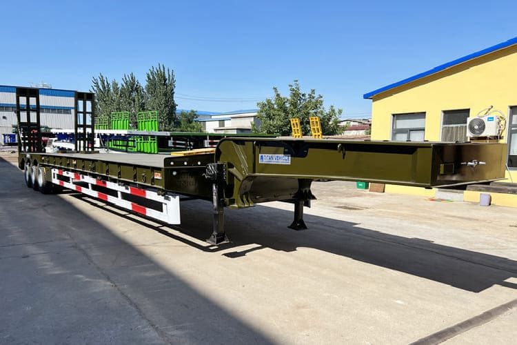 TITAN Low Bed Trailer Truck for Sale in Zambia - Semireboque baixa: foto 1 TITAN Low Bed Trailer Truck for Sale in Zambia - Semireboque baixa: foto 1
