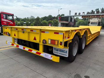 TITAN Rgn Lowboy Trailer for Sale in Zambia - Semireboque baixa: foto 1 TITAN Rgn Lowboy Trailer for Sale in Zambia - Semireboque baixa: foto 1