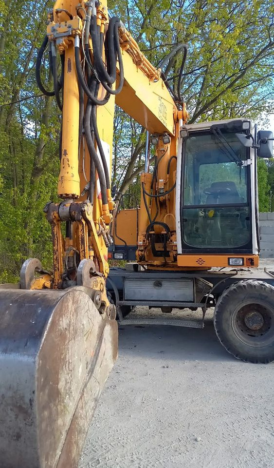 Liebherr A316 - Escavadeira de rodas: foto 2 Liebherr A316 - Escavadeira de rodas: foto 2