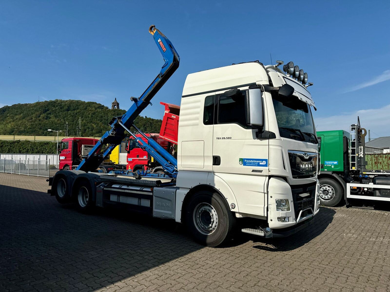 MAN TGX 26.580 BL 6x2 Zwillingbereifte Liftachse Abroller Hiab Funk- - Caminhão polibenne: foto 4 MAN TGX 26.580 BL 6x2 Zwillingbereifte Liftachse Abroller Hiab Funk- - Caminhão polibenne: foto 4