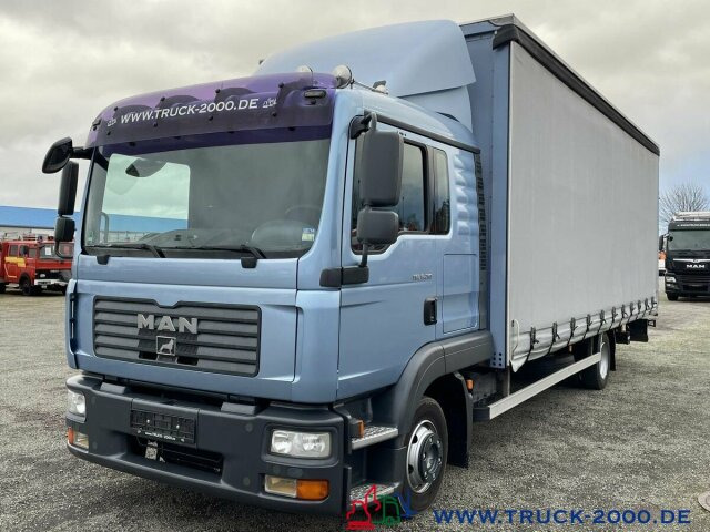 MAN TGL 9.210 Schiebeplane L+R LBW Großes Haus/ Bett - Caminhão com lona: foto 2 MAN TGL 9.210 Schiebeplane L+R LBW Großes Haus/ Bett - Caminhão com lona: foto 2