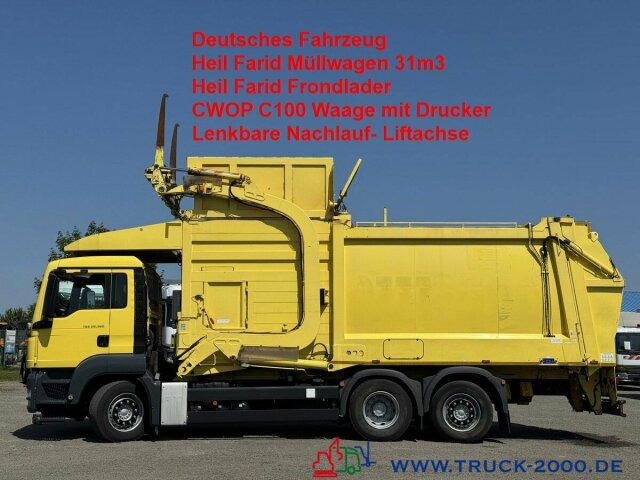 MAN TGS 26.360 Heil 31m3 Überkopf/ Frontlader Waage - Caminhão de lixo: foto 1 MAN TGS 26.360 Heil 31m3 Überkopf/ Frontlader Waage - Caminhão de lixo: foto 1