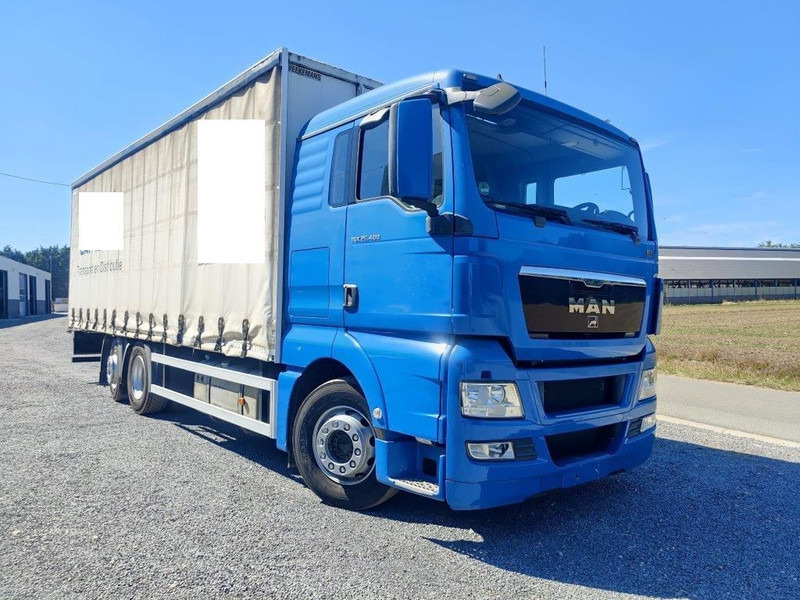 MAN TGS 26.400 Euro 5 Schuifzeilenbak / Curtains - Caminhão com lona: foto 2 MAN TGS 26.400 Euro 5 Schuifzeilenbak / Curtains - Caminhão com lona: foto 2
