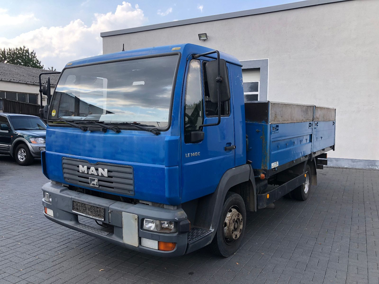 MAN LE 140 C Klima, Tempomat, TÜV 11-2025 - Furgão caixa aberta: foto 1 MAN LE 140 C Klima, Tempomat, TÜV 11-2025 - Furgão caixa aberta: foto 1