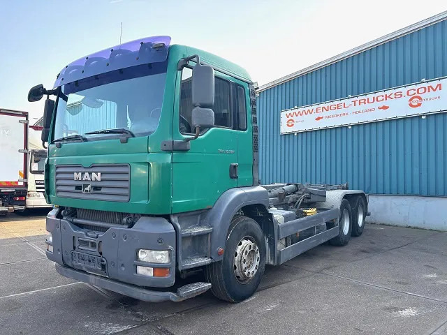 MAN TGA 26.360BB 6x4 FULL STEEL MULTILIFT HOOK-ARM (ZF16 MANUAL GEARBOX / FULL STEEL SUSPENSION / REDUCTION AXLES / AIRCONDITIONING) - Caminhão polibenne: foto 1 MAN TGA 26.360BB 6x4 FULL STEEL MULTILIFT HOOK-ARM (ZF16 MANUAL GEARBOX / FULL STEEL SUSPENSION / REDUCTION AXLES / AIRCONDITIONING) - Caminhão polibenne: foto 1