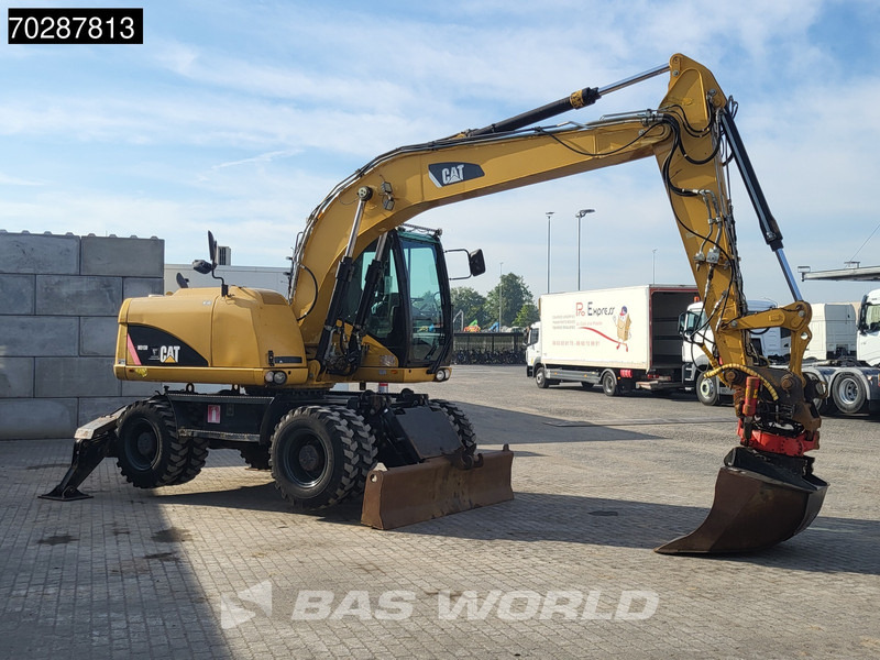 Escavadeira de rodas Caterpillar M313 D: foto 9