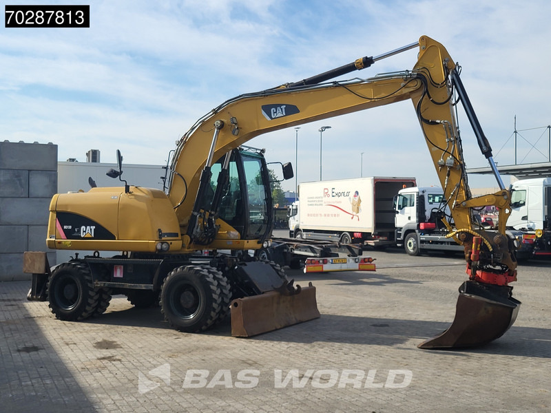 Escavadeira de rodas Caterpillar M313 D: foto 10