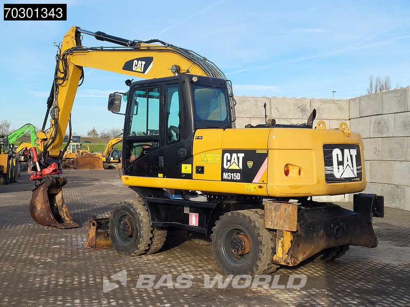 Caterpillar M315 D OUTRIGGERS + BLADE - Escavadeira de rodas: foto 5 Caterpillar M315 D OUTRIGGERS + BLADE - Escavadeira de rodas: foto 5