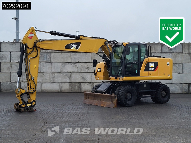 Caterpillar M320 F - Escavadeira de rodas: foto 1 Caterpillar M320 F - Escavadeira de rodas: foto 1