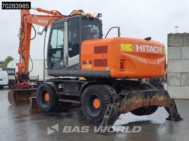 Hitachi ZX140W -3 OUTRIGGERS - ROTOTILT - Escavadeira de rodas: foto 2 Hitachi ZX140W -3 OUTRIGGERS - ROTOTILT - Escavadeira de rodas: foto 2