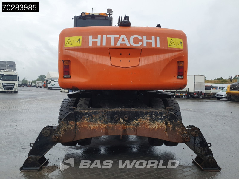 Hitachi ZX140W -3 OUTRIGGERS - ROTOTILT - Escavadeira de rodas: foto 3 Hitachi ZX140W -3 OUTRIGGERS - ROTOTILT - Escavadeira de rodas: foto 3