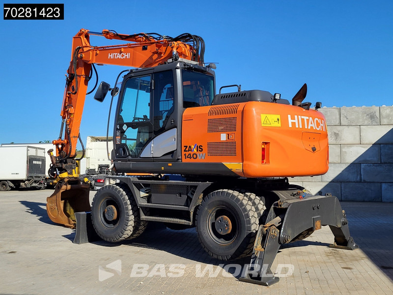 Hitachi ZX140W -5 OUTRIGGERS + BLADE - Escavadeira de rodas: foto 3 Hitachi ZX140W -5 OUTRIGGERS + BLADE - Escavadeira de rodas: foto 3