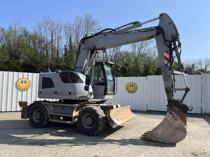 Liebherr A914 COMPACT - Escavadeira de rodas: foto 1 Liebherr A914 COMPACT - Escavadeira de rodas: foto 1