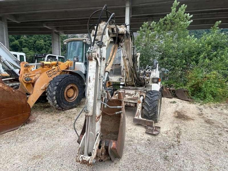 Escavadeira de rodas Mecalac 8CXI: foto 24 Escavadeira de rodas Mecalac 8CXI: foto 24