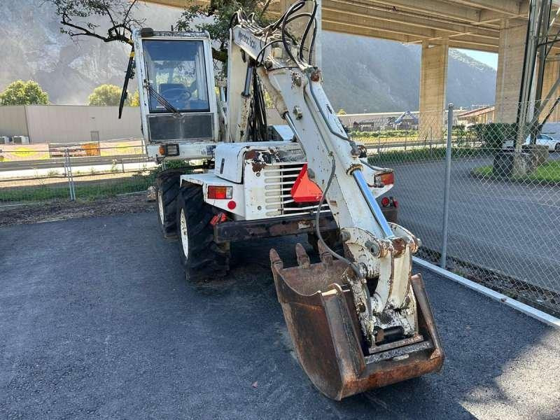 Escavadeira de rodas Mecalac 8CXI: foto 37 Escavadeira de rodas Mecalac 8CXI: foto 37