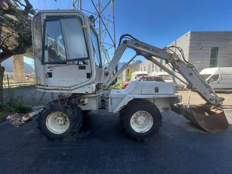 Escavadeira de rodas Mecalac 8CXI: foto 41 Escavadeira de rodas Mecalac 8CXI: foto 41