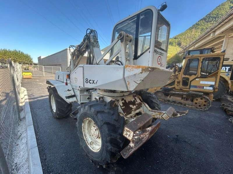 Escavadeira de rodas Mecalac 8CXI: foto 43 Escavadeira de rodas Mecalac 8CXI: foto 43