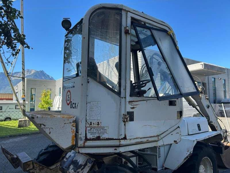 Escavadeira de rodas Mecalac 8CXI: foto 38 Escavadeira de rodas Mecalac 8CXI: foto 38