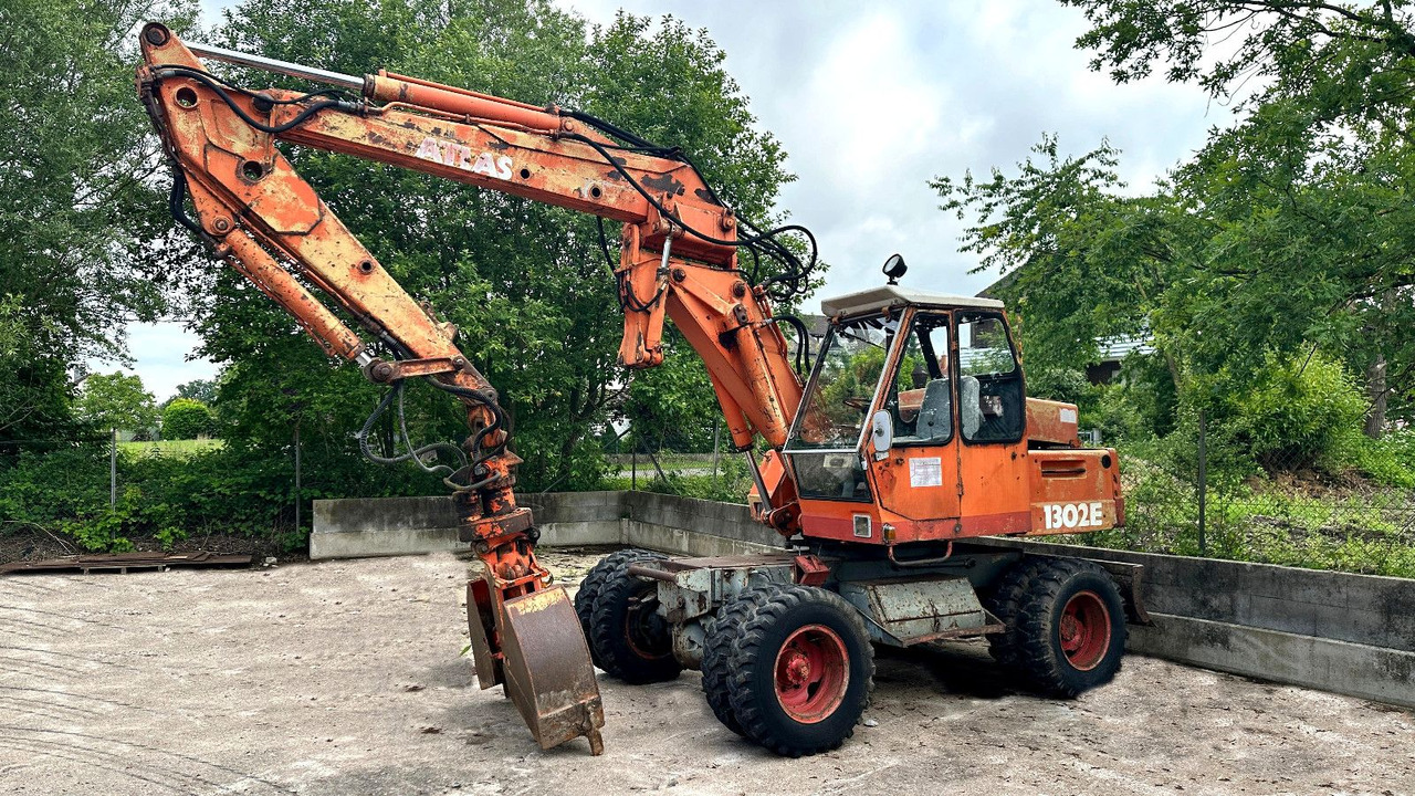 Atlas MOBILBAGGER 1302 E - Escavadeira de rodas: foto 1 Atlas MOBILBAGGER 1302 E - Escavadeira de rodas: foto 1