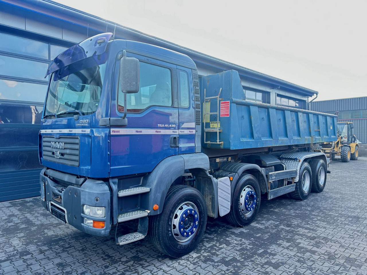 MAN TGA 41.430 8x4 Abrollkipper + Meiller Aufbau - Caminhão polibenne: foto 2 MAN TGA 41.430 8x4 Abrollkipper + Meiller Aufbau - Caminhão polibenne: foto 2
